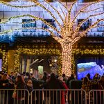 Crowds gather around Rockefeller Center to see Saks Fifth Avenue's dazzling Frozen holiday lights and window display